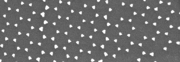 Nanosphere lithography pattern of gold and graphene oxide for nanoelectronics applications 