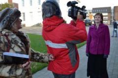 Image of media training participants with camera