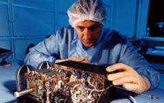 Image of scientist with Ptolemy intrument at The Open University